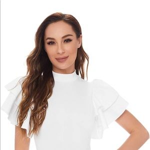 White bodysuit with ruffled sleeves